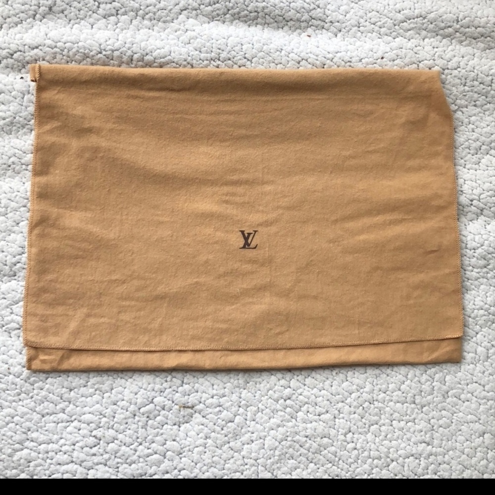 Brown purse/tote**There is no dust bag**